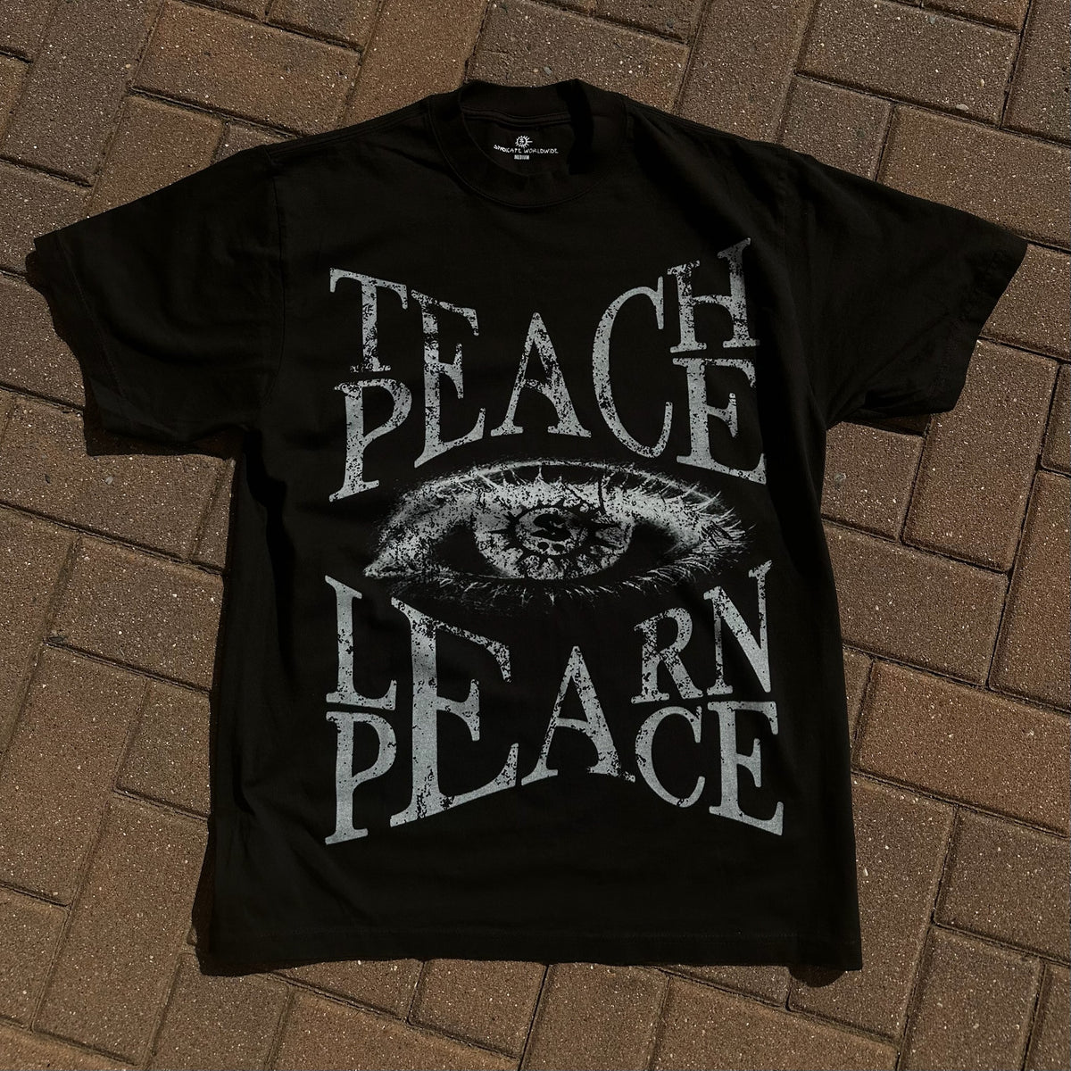 SYNDICATE "TEACH PEACE, LEARN PEACE" TEE