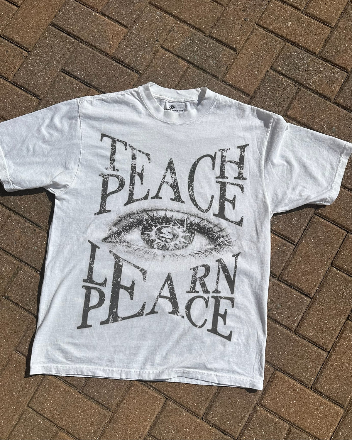 SYNDICATE "TEACH PEACE, LEARN PEACE" TEE